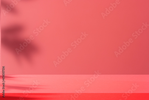 Beautiful minimalist colored background with blurred leaf shadows on a red wall. Beautiful background for presentations.
