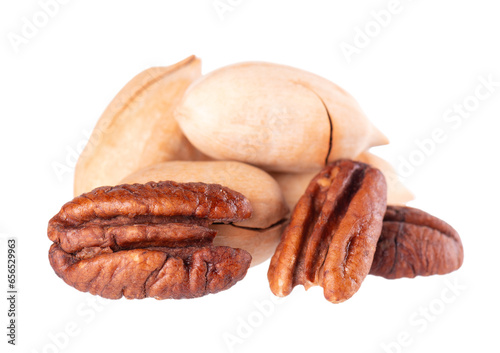 Pecan nuts isolated on white background. Shelled and unshelled pecan. Clipping path.