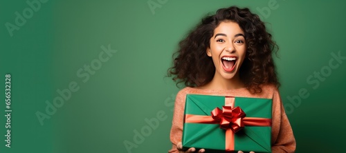 Happy Woman Holding a Chris...