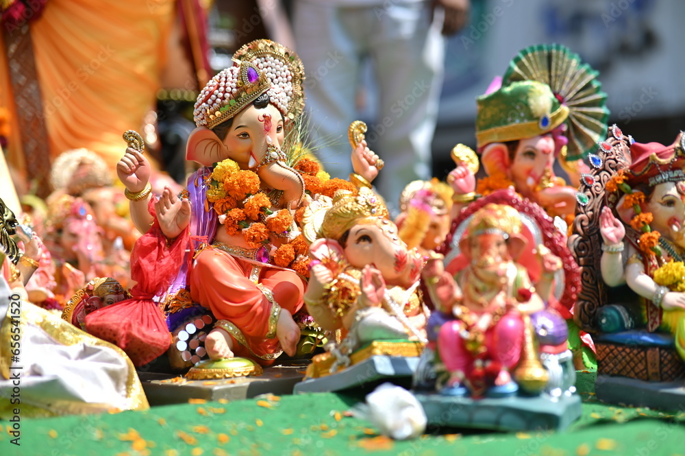 Collection of statues of the lord Ganesha in the street. God with
