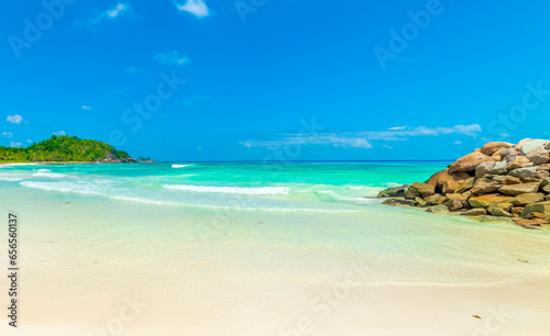 White sand and turquoise water in Anse Kerlan beach photo