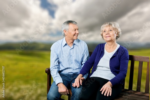 Happy active old senior couple outdoors. © BillionPhotos.com