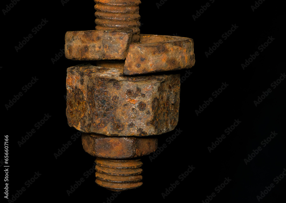 rusty nut. Rusty iron rod with screw threads. Rusted mechanical components. threaded bolt and nut isolated close up. dismantling concept, difficult to unscrew, non-removable. selective focus rusty nut. Rusty iron rod with screw threads. Rusted mechanical components. threaded bolt and nut isolated close up. dismantling concept, difficult to unscrew, non-removable. selective focus