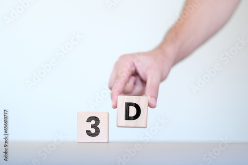 Man ordering 3D word on wooden block cubes, three dimensional or design idea, wooden block cubes with 3D text on it, wood blocks on white background, banner idea