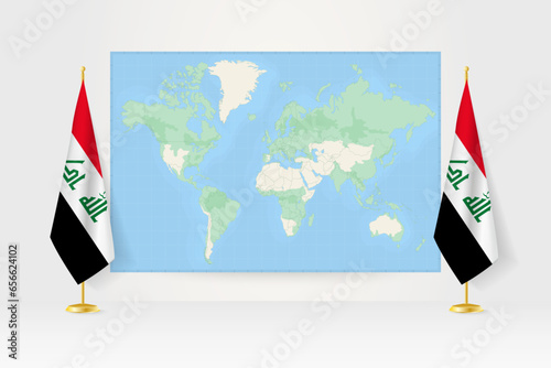 World Map between two hanging flags of Iraq flag stand.