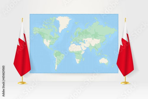 World Map between two hanging flags of Bahrain flag stand.