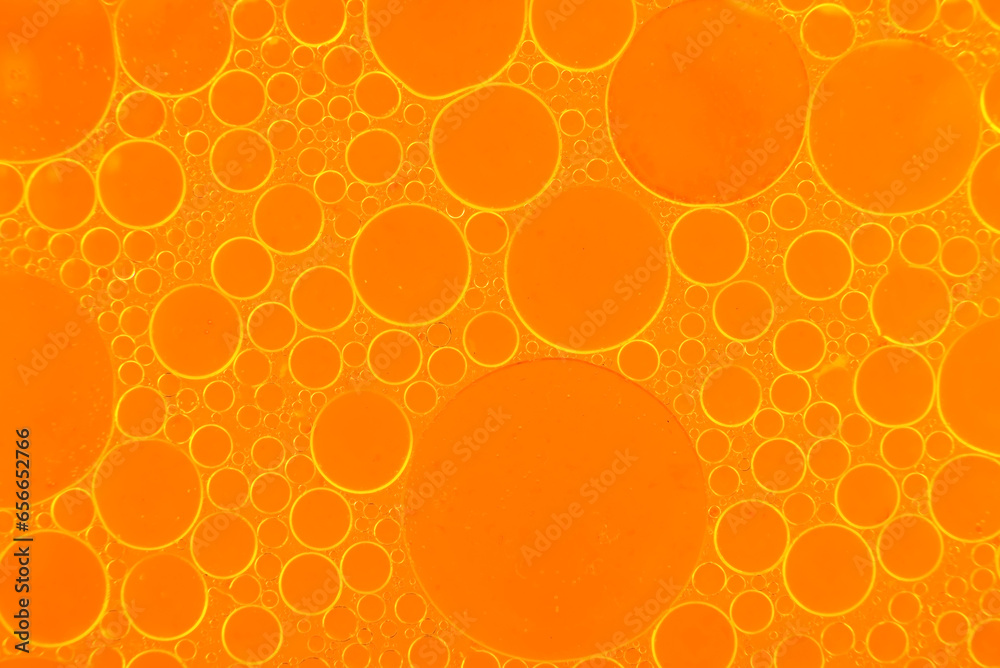 Vegetable oil texture. Oil bubbles in water Vegetable oil texture. Oil bubbles in water