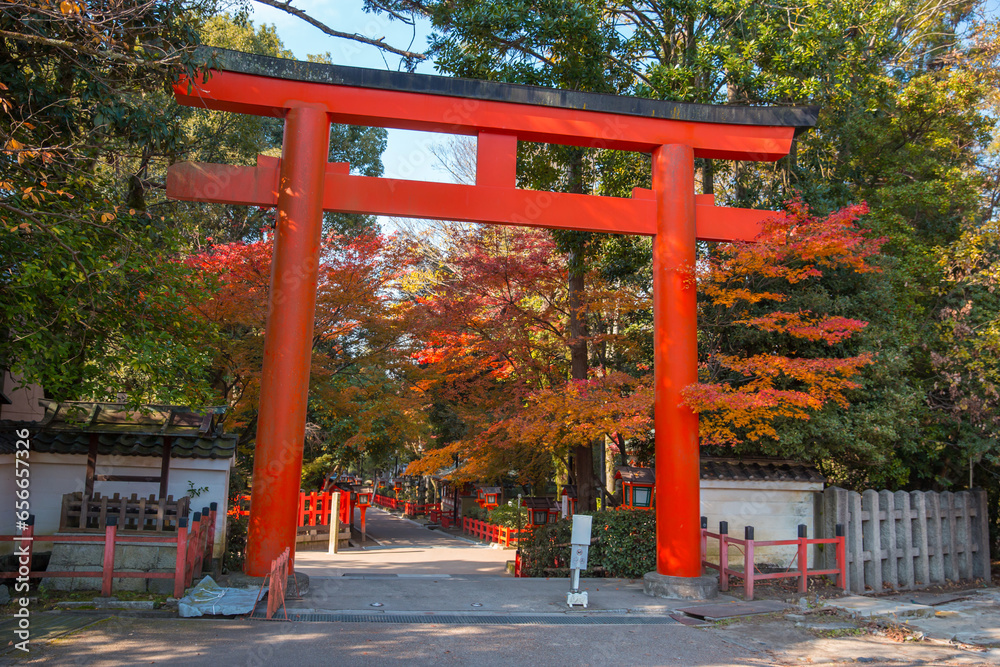 Torii red wooden gate Japan traditional in Shinto shrines temple entrance symbol of transition from the mundane to the sacred Torii red wooden gate Japan traditional in Shinto shrines temple entrance symbol of transition from the mundane to the sacred