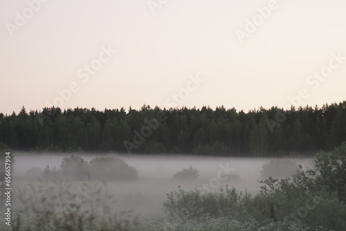 misty morning on the river © belavinstock