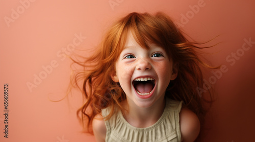 portrait of adorable toddler laughing © Noelia