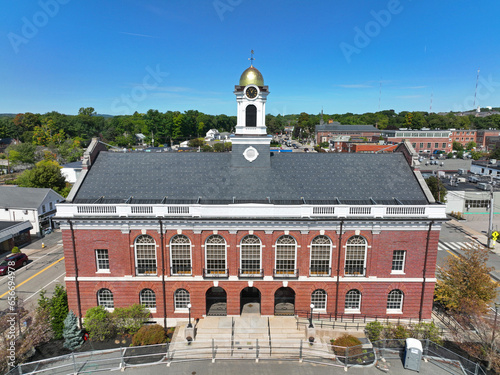 Needham Town Hall aerial view at 1471 Highland Avenue in historic town center of Needham, Massachusetts MA, USA. photo