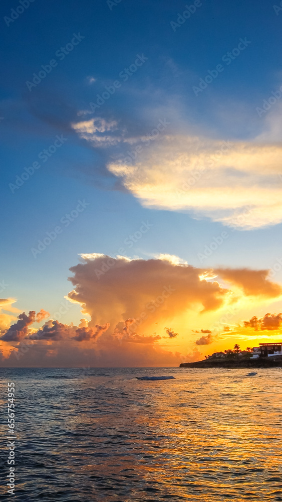 Sunset in Beautiful Cayman Islands aerial view of Grand Cayman paradise in the Caribbean surrounded by the sea Sunset in Beautiful Cayman Islands aerial view of Grand Cayman paradise in the Caribbean surrounded by the sea