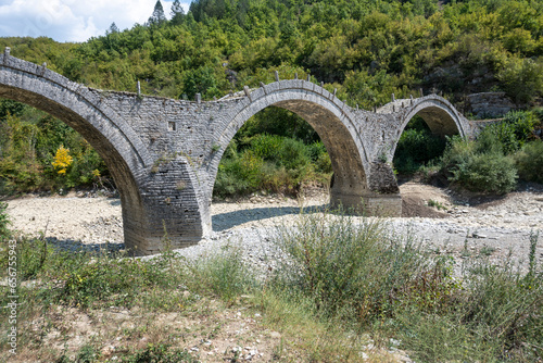 Medieval Plakidas Bridge at Pindus Mountains, Greece photo