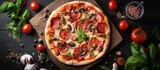 Italian Pizza with mushrooms basil tomato olives and cheese seen from above on a white wooden table Prosciutto and Capricciosa variations included Homemade and adorned Photo caption with co