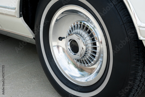 Close Up of Reto Wheel and White Wall Tire on Classic Luxury Car © swatch+soda
