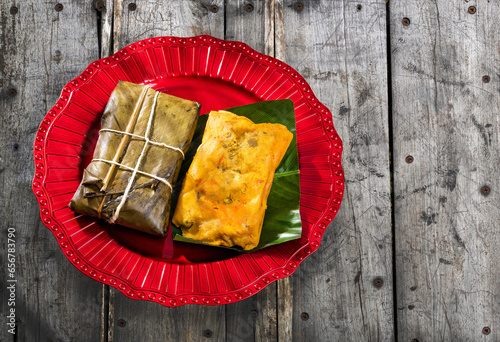 Delicious tamales wrapped in leaves - Traditional Colombian food photo