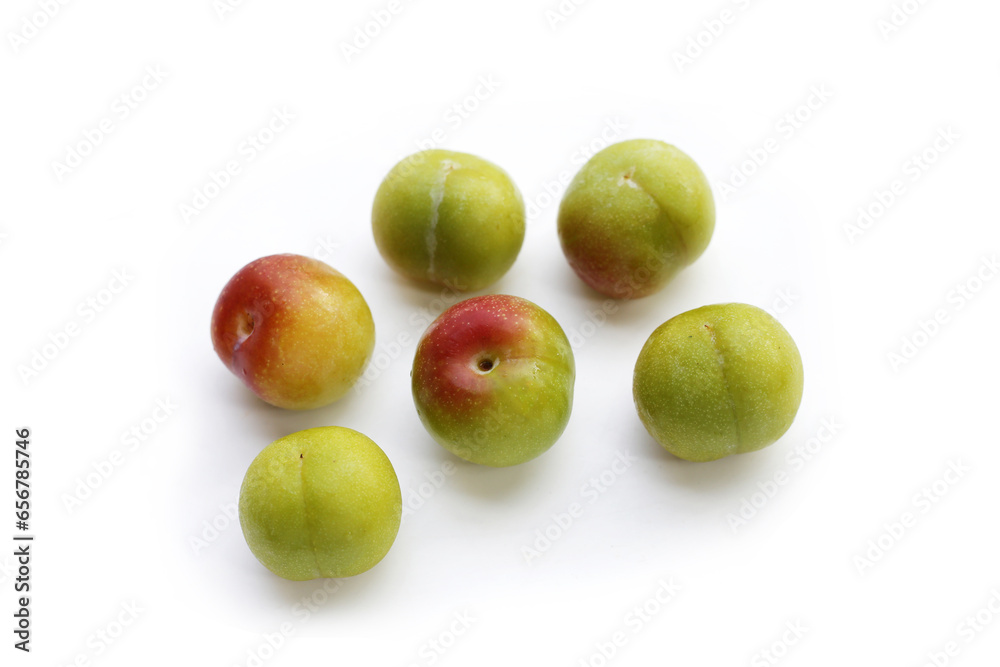 Fresh green plum on white background Fresh green plum on white background