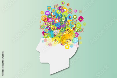 Human head image and colored flowers, mental health concept