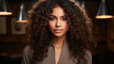 A beautiful woman with long curly hair wearing a brown shirt. Generative AI. 