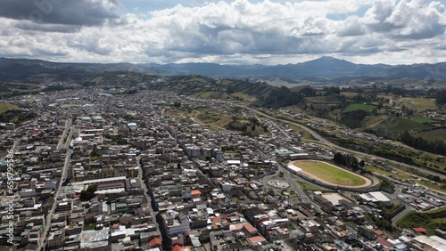 Tulcan is the capital of the province of Carchi located in Ecuador, aerial shot of the town in a sunny day.