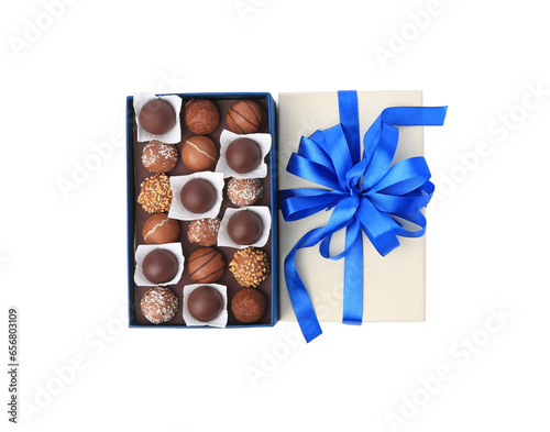 Box with delicious chocolate candies isolated on white, top view