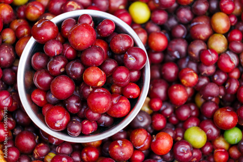 fresh red plum background for sale  in fruit market