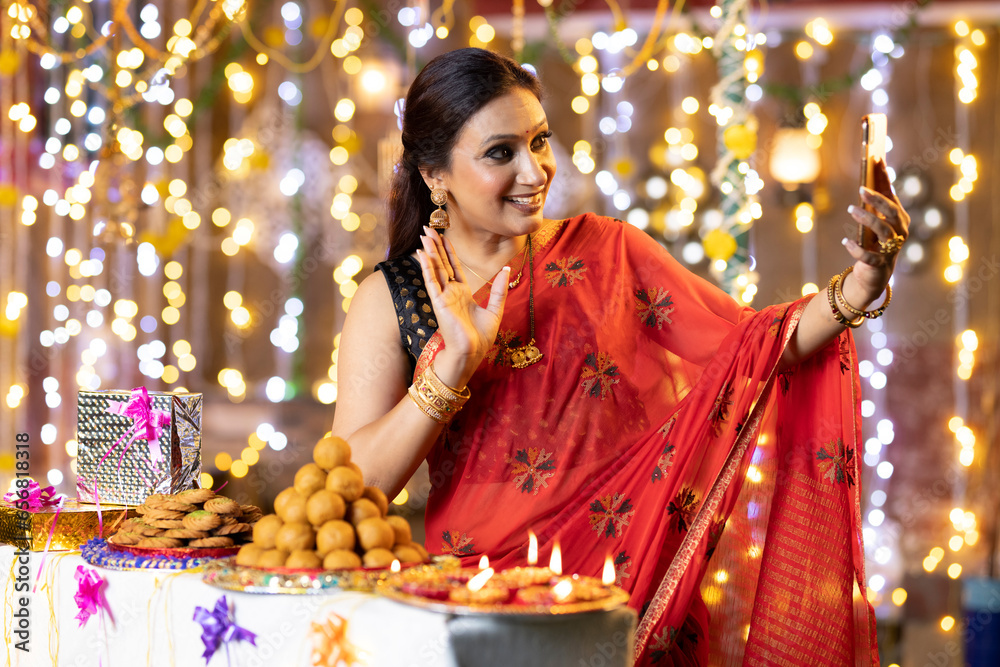 Young woman diwali celebrate-video call