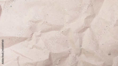 Craft crumpled paper, cardboard background. Brown kraft sheet texture, torn antique page, wallpaper or parchment abstract design. Brown crumpled paper texture. Abstract brown recycled paper background