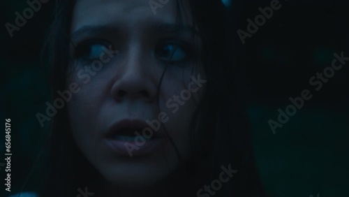 A frightened girl in a bloody dress got lost in the woods