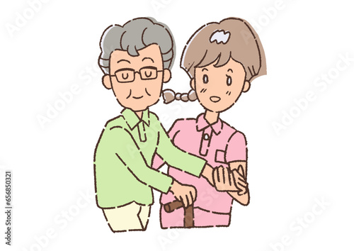 介護士に、歩行の手助けをしてもらっている、おじいさん。