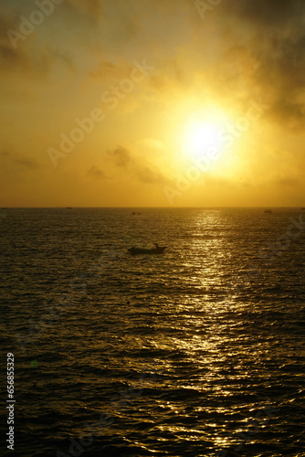 Beautiful sunrise view at Teluk Penyu beach, Cilacap, Indonesia. photo