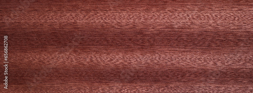 Closeup texture of wooden flooring made of Sapele photo