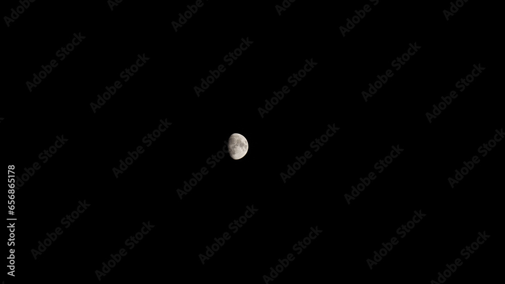 Full moon over clouds. Shone circle of the moon in darkness on a background of the star sky and clouds Full moon over clouds. Shone circle of the moon in darkness on a background of the star sky and clouds