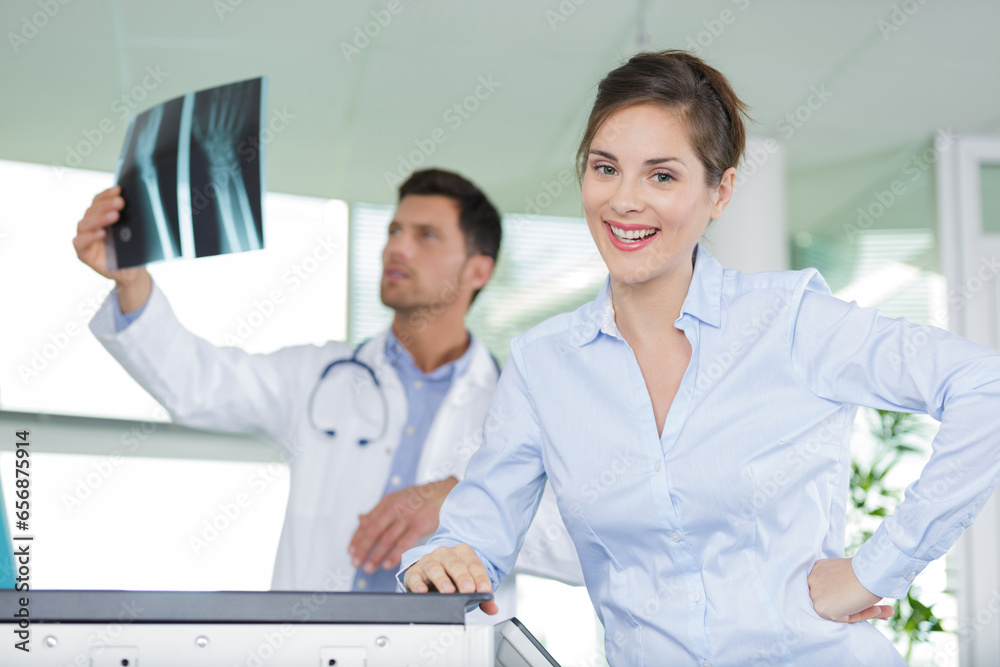 doctor with spine x-ray and senior man at hospital doctor with spine x-ray and senior man at hospital