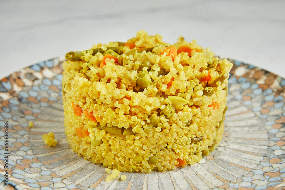 Quinoa pilaf with carrots, zucchini and green peas Quinoa pilaf with carrots, zucchini and green peas