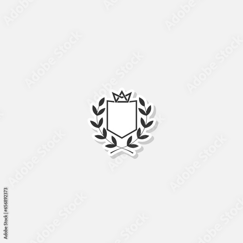 Shield with crown sticker isolated on gray background