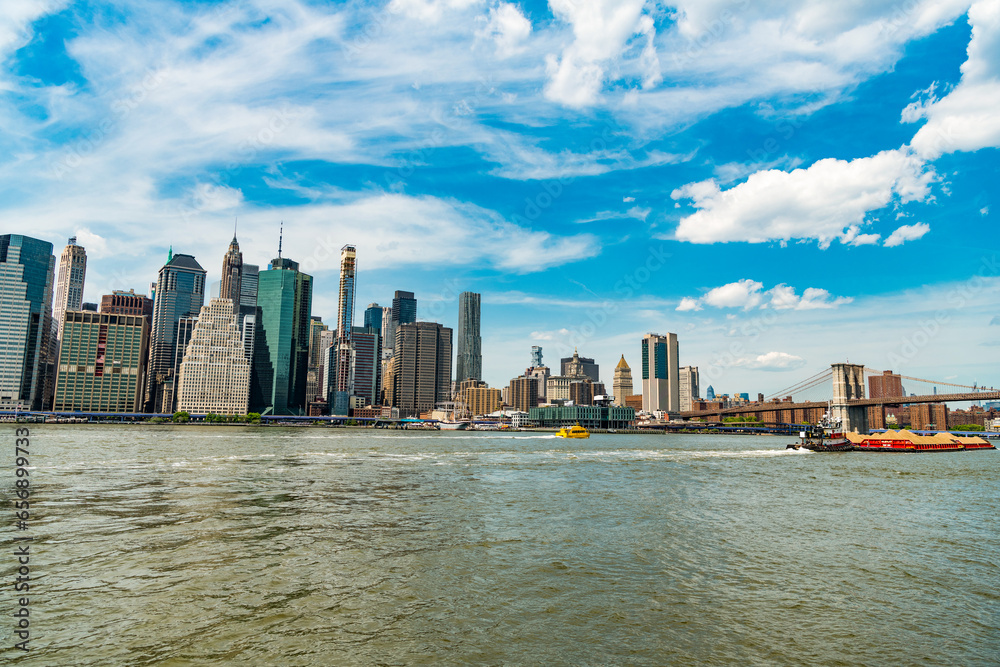 Fototapeta premium architectural cityscape in new york city. skyscraper skyline of manhattan. new york downtown architecture. city skyscraper of manhattan. modern skyscraper cityscape in midtown. New York City landmark