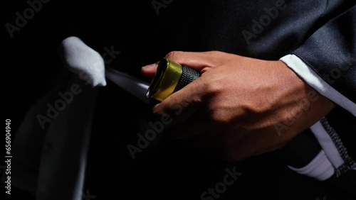 Samurai warrior gripping the sword