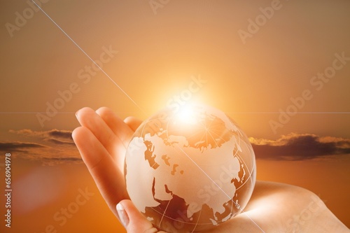 Fototapeta Naklejka Na Ścianę i Meble -  Planet Earth globe in the human hands