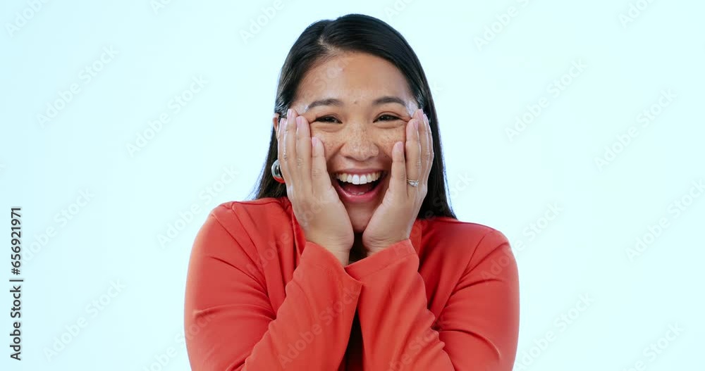 Surprise. happy and woman face with winner, good news and discount deal in a studio. Wow, shock and female person with a smile from japan with sale announcement and winning with blue background Surprise. happy and woman face with winner, good news and discount deal in a studio. Wow, shock and female person with a smile from japan with sale announcement and winning with blue background
