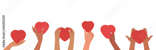 Human hands holding and giving red hearts. Concept of sharing love, compassion with people. Love symbols banner