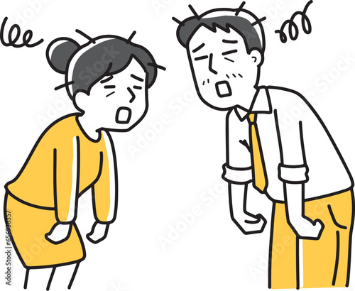 疲れ切っている男女の会社員
