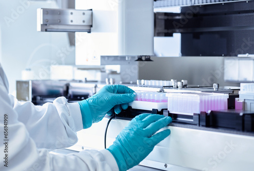 Scientist examining medical sample in laboratory