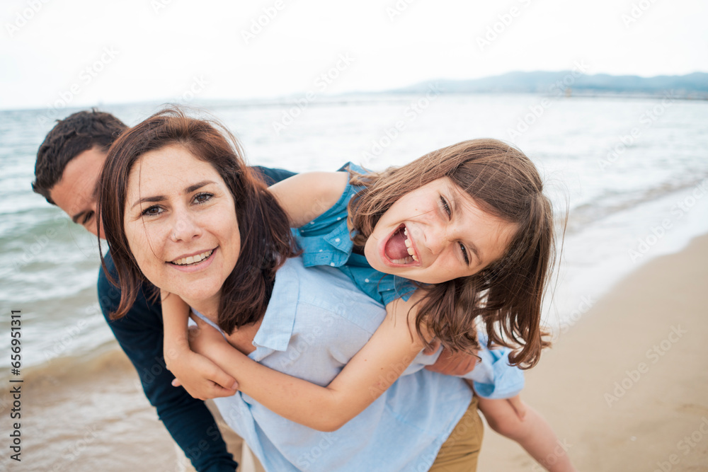 Happy family together enjoying vacations at beach Happy family together enjoying vacations at beach