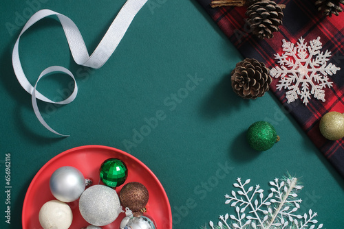 Fotografie Dark green background with decorations of Xmas day