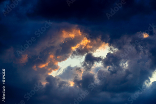 Dark storm clouds covering sky photo