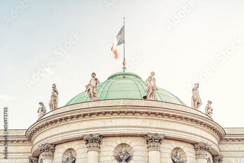 France, Ile-De-France, Paris, Sculptures on top of dome of Great Chancellery of Order of Legion of Honor photo