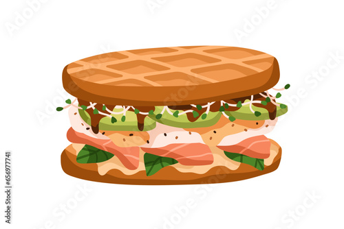 Waffle sandwich with salmon, greens and avocado slices. Tasty breakfast food,...