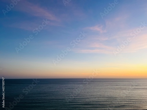 Natural sunset sea background, sunset sea horizon, quiet and peaceful
