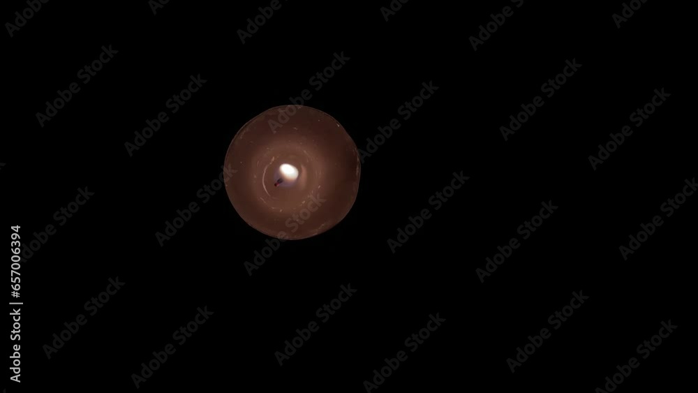 the candle burns, goes out and lights up again in the dark. High quality 4k footage the candle burns, goes out and lights up again in the dark. High quality 4k footage